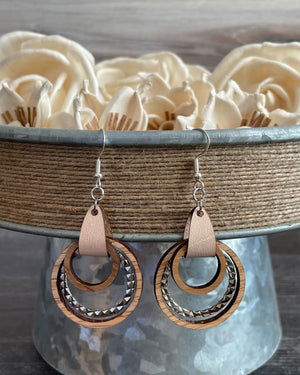 
                  
                    Wood and Leather Hoop Earrings with textured metal accent
                  
                