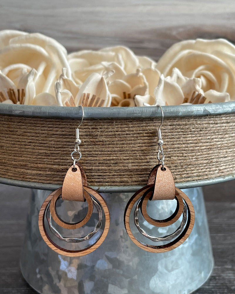 
                  
                    Wood and Leather Hoop Earrings with metal accent
                  
                