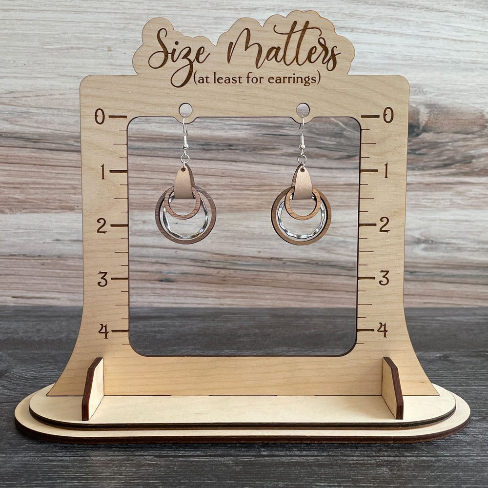 
                  
                    Wood and Leather Hoop Earrings with textured metal accent
                  
                