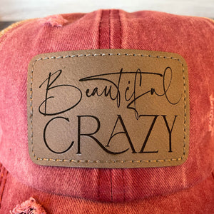 
                  
                    Beautiful Crazy | Women's Distressed Pony Cap with Engraved Leather Patch
                  
                