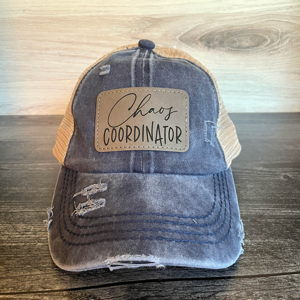 
                  
                    Chaos Coordinator | Women's Distressed Pony Cap with Engraved Leather Patch
                  
                