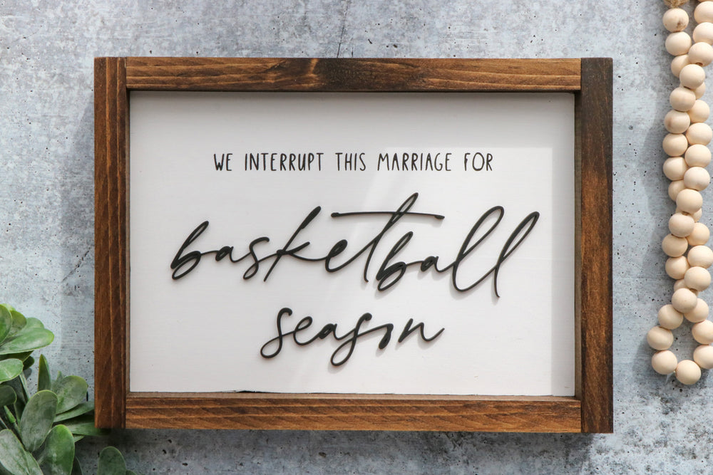 
                  
                    We Interrupt This Marriage/Family For . . . Season | Framed Laser Wood Sign | 12x9
                  
                