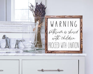 
                  
                    Warning Bathroom Shared With Children | Framed Wood Sign
                  
                