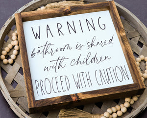 
                  
                    Warning Bathroom Shared With Children | Framed Wood Sign
                  
                