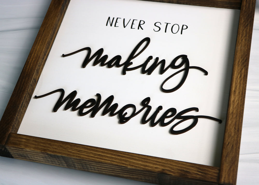 
                  
                    Never Stop Making Memories | Framed Laser Wood Sign
                  
                