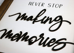 
                  
                    Never Stop Making Memories | Framed Laser Wood Sign
                  
                