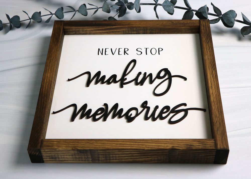 
                  
                    Never Stop Making Memories | Framed Laser Wood Sign
                  
                