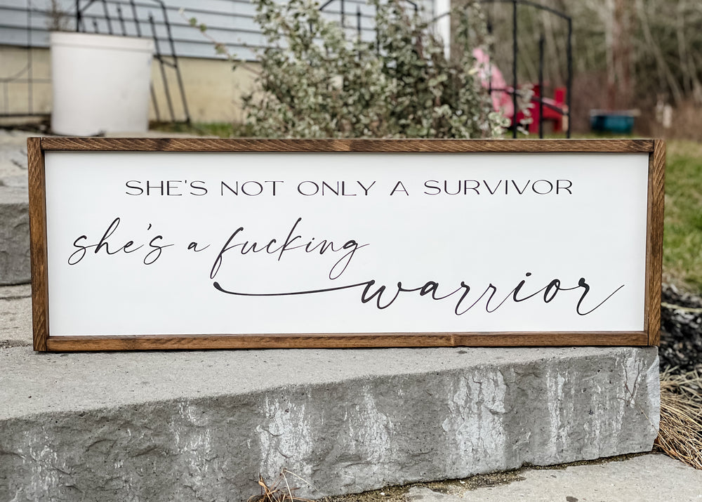 
                  
                    She's Not Only A Survivor She's A Fucking Warrior | Framed Wood Sign
                  
                