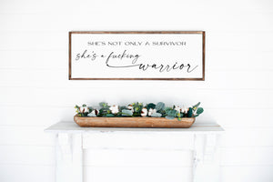 
                  
                    She's Not Only A Survivor She's A Fucking Warrior | Framed Wood Sign
                  
                