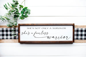 
                  
                    She's Not Only A Survivor She's A Fearless Warrior | Framed Wood Sign
                  
                