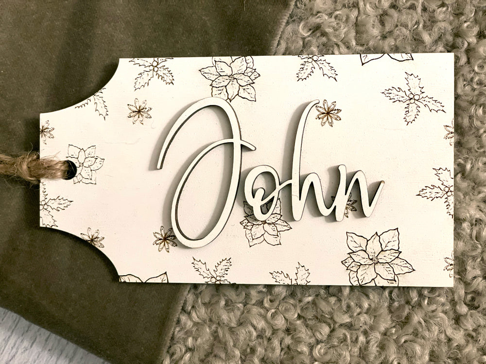 
                  
                    3D Name Stocking Tag with Engraved Holiday Design | Multiple Name Colors Available
                  
                