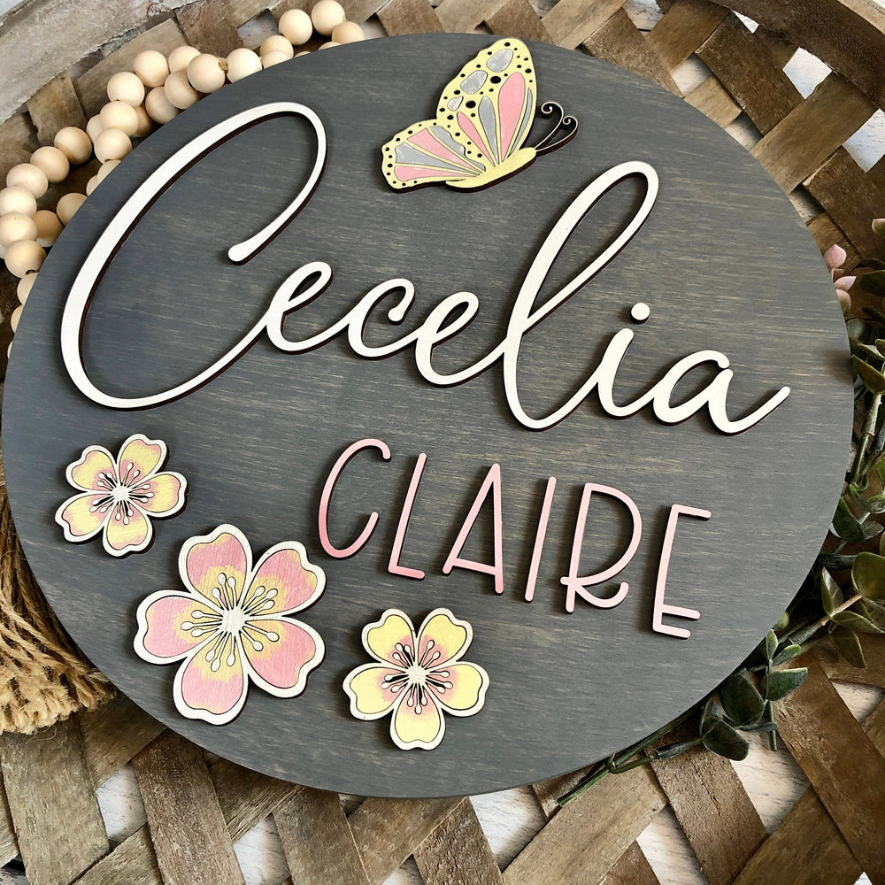 
                  
                    Personalized Nursery Sign | Baby Girl | Flowers & Butterfly | 12" round
                  
                